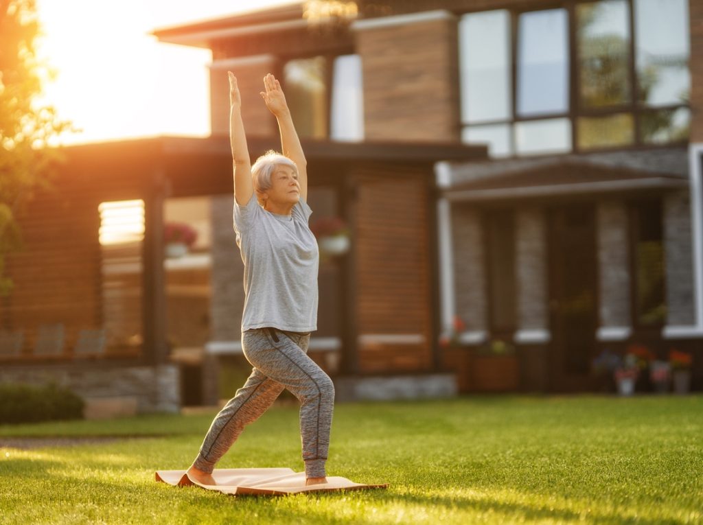 Mature woman doing lunges as part of strength training routine for beginners