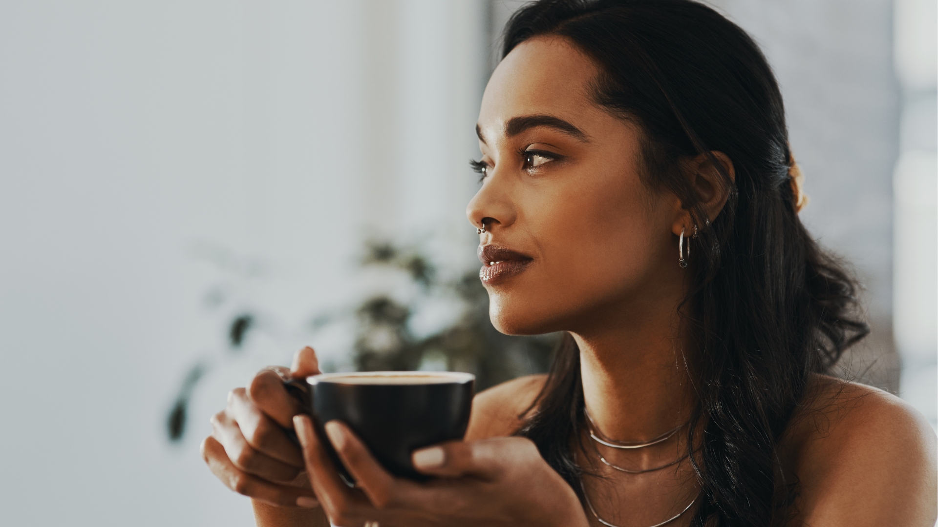 woman calmly drinking tea