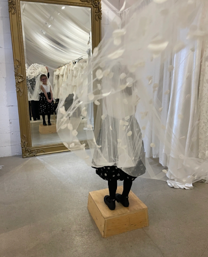 tosca reno at a wedding dress fitting
