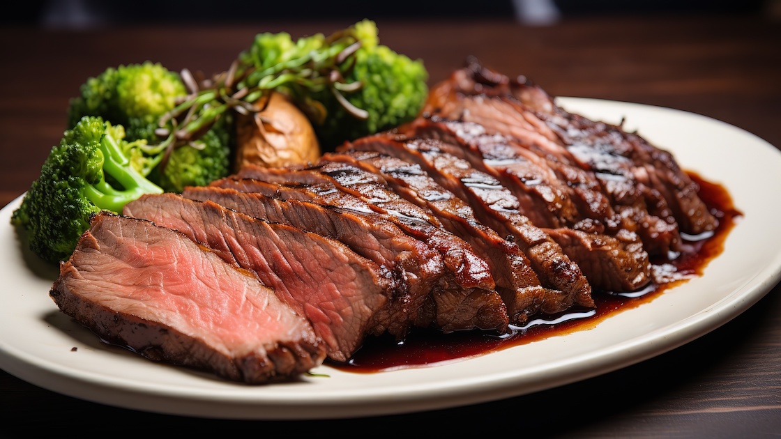 Delicious and juicy fried beef brisket on a plate