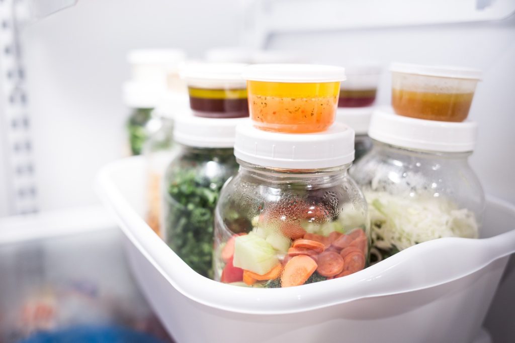 Mason jars containing prepared food as part of meal prep storage best practices